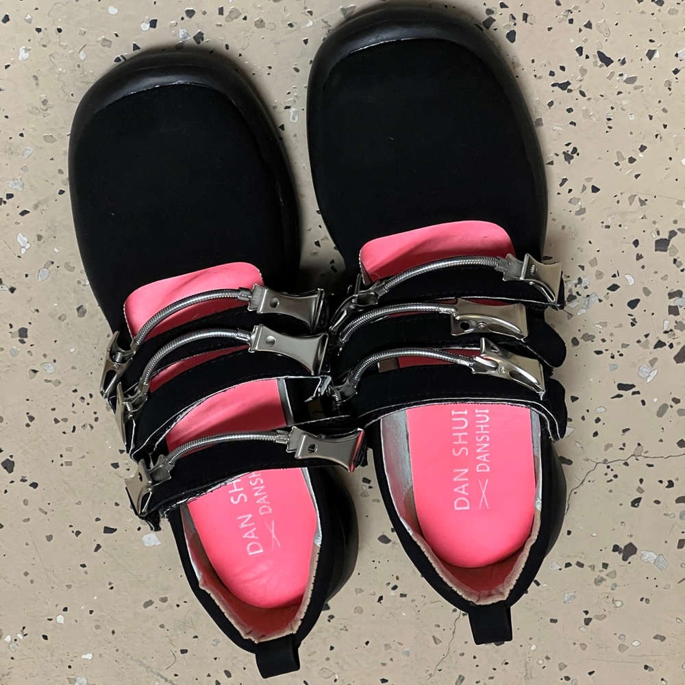 Modern-designed shoes with metal decorations